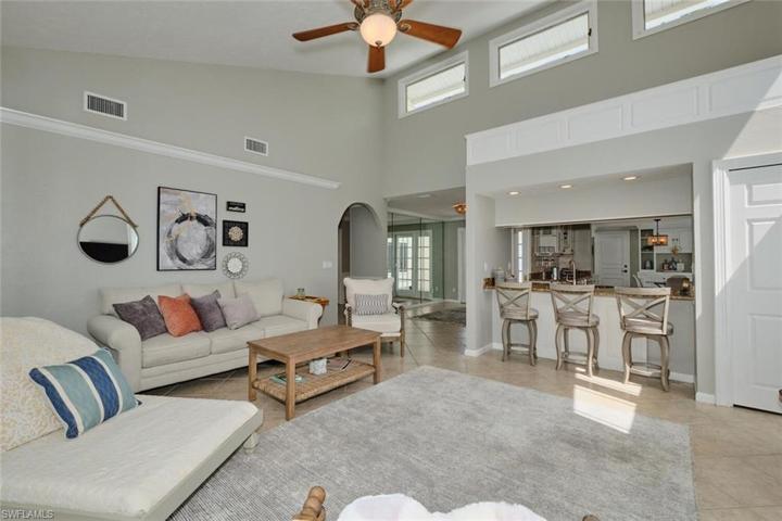 Great room has vaulted ceilings.