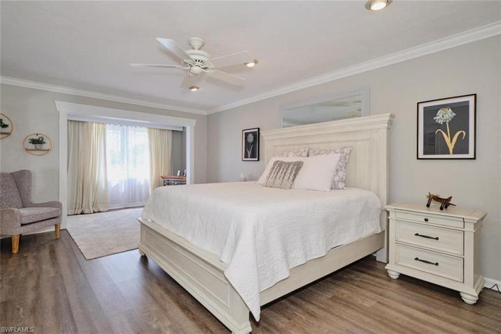 Large mast suite features a sitting area and large walk-in closet.