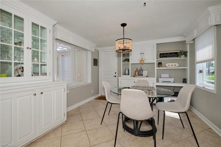 Lighted storage cabinet off the breakfast area.