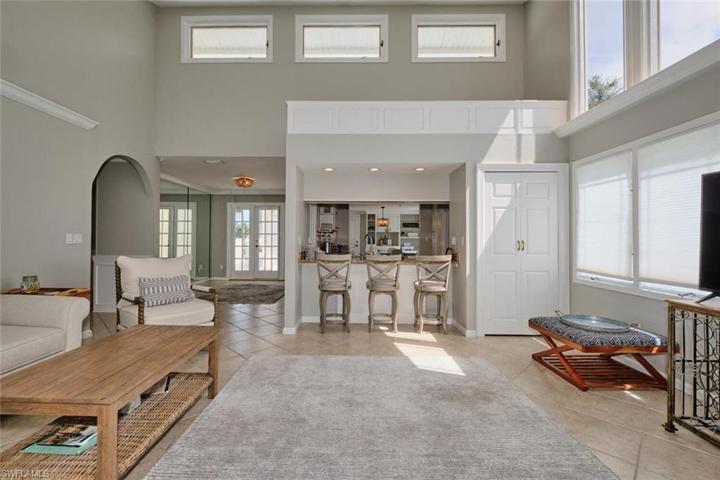 Great room is open to kitchen with breakfast bar.