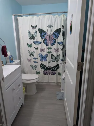 Bathroom with vanity and toilet