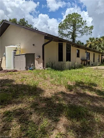 View of rear view of property showing whole house reverse osmosis system.
