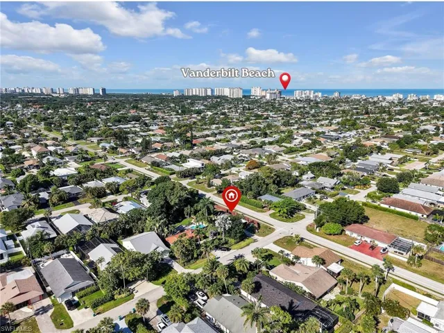 Aerial perspective showcasing the property within a residential neighborhood