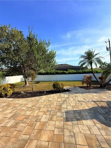 View of fenced backyard