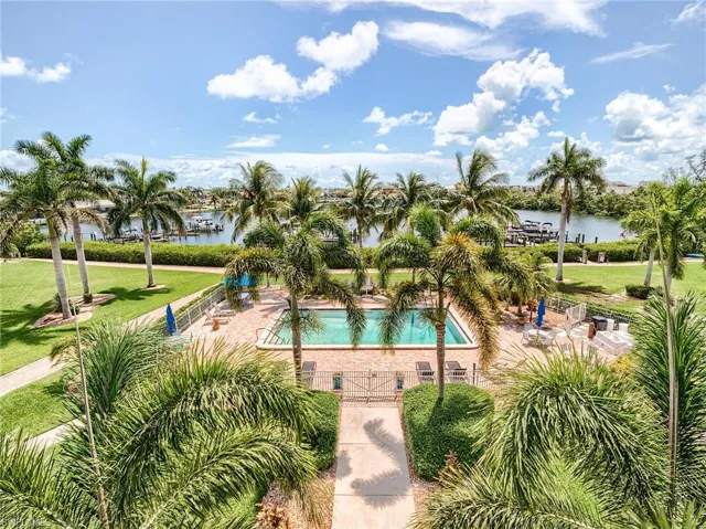 Condominiums overlook the pool and back bay