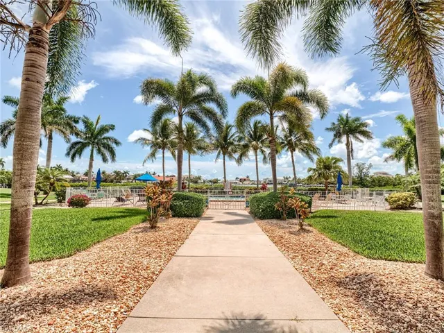 Well manicured landscaping surrounds the pool