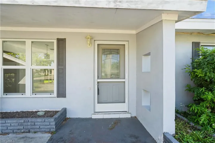 Front entry with new door with glass insert