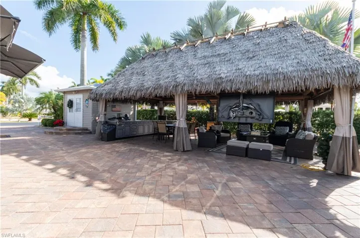 View of patio / terrace with a gazebo, an outdoor living space, area for grilling, and outdoor dining space