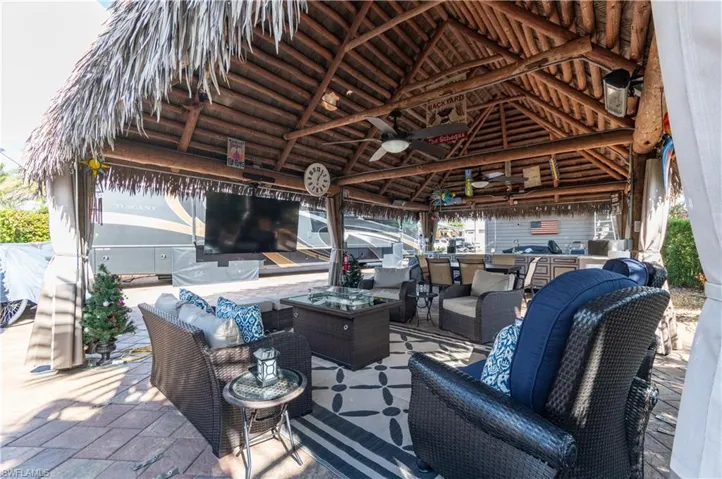 View of patio / terrace featuring an outdoor hangout area and a ceiling fan