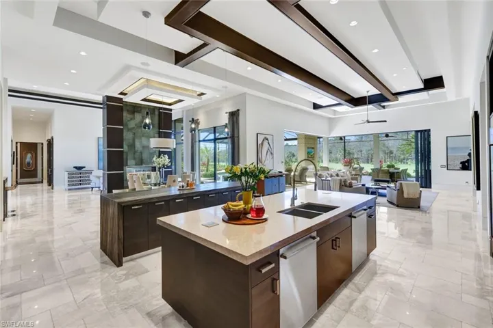 Two dishwashers on either side of the kitchen sink- this kitchen is a Chef's dream!