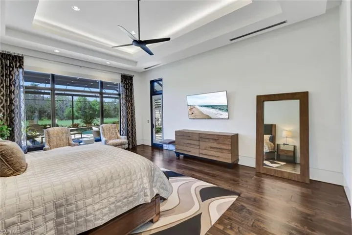 Primary bedroom with direct access to the outdoor resort style area