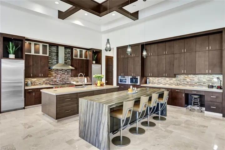 Double Island with ample seating and wonderful counter and cabinet storage.