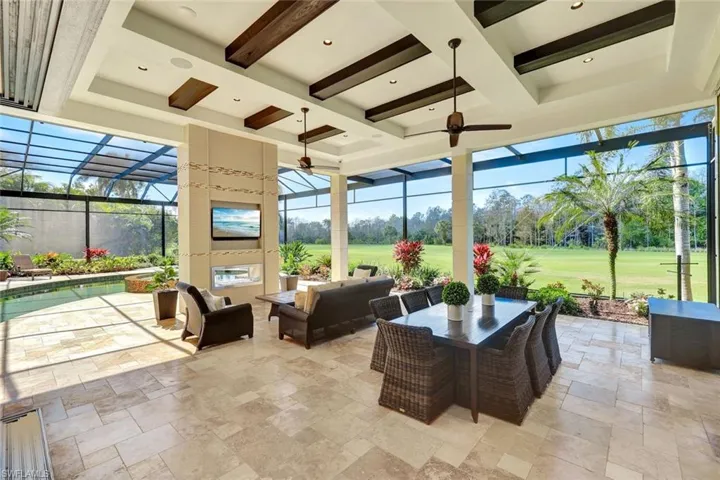 Outdoor double sided fireplace overlooking your incredible views!