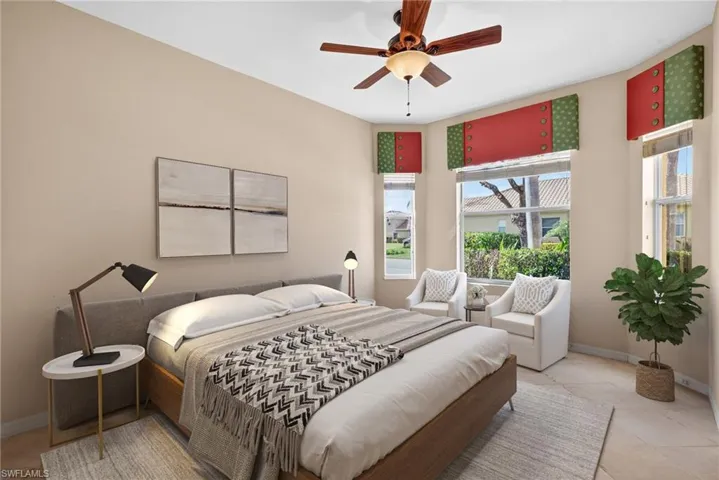 Bedroom featuring a ceiling fan and light tile patterned floors