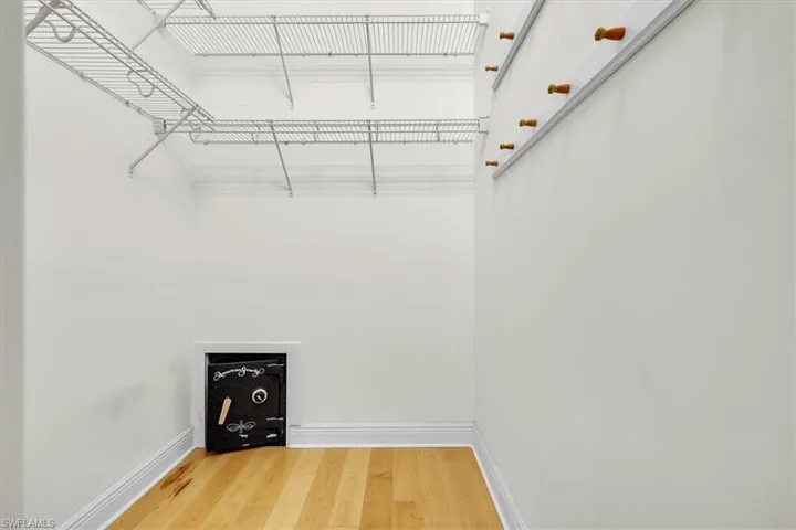 Walk in closet with a safe