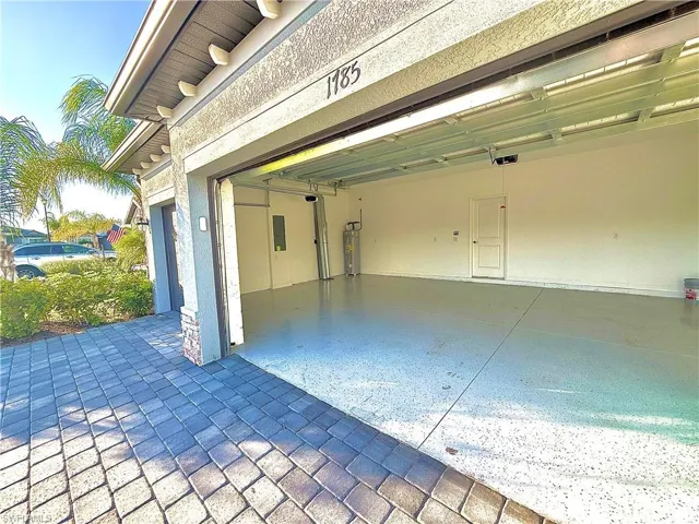 Garage featuring water heater