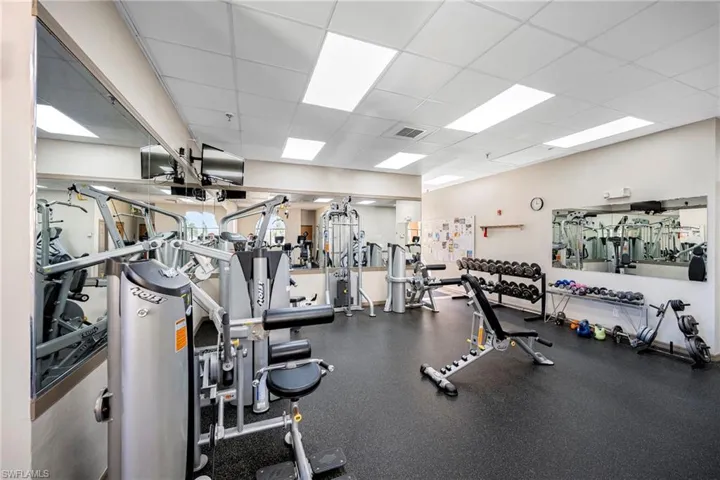 Exercise room with a paneled ceiling