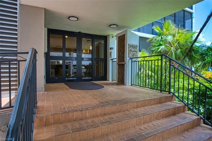 View of exterior entry with automatic sliding door, locked and security keyed entrance