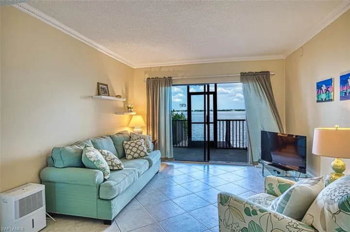 Den - can be set up as an office/bedroom/or extra living area with sliders to the lanai and private door to the riverfront walkway