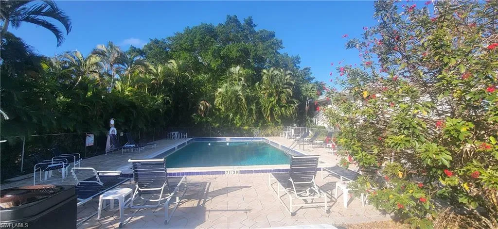 View of heated pool featuring a patio