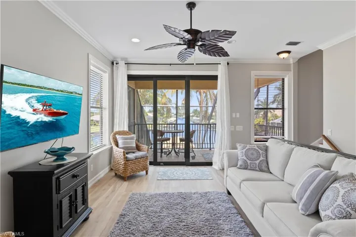 2nd floor Living room featuring ceiling fan, light hardwood / wood-style flooring, and ornamental molding