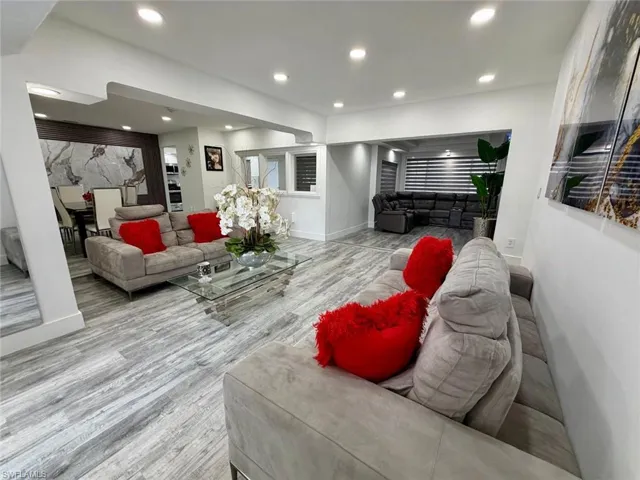 Living room featuring recessed lighting and light wood finished floors