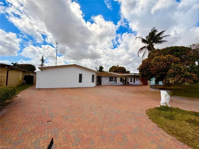 View of front of home featuring stucco siding