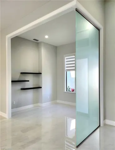 Spare room featuring visible vents, baseboards, and recessed lighting
