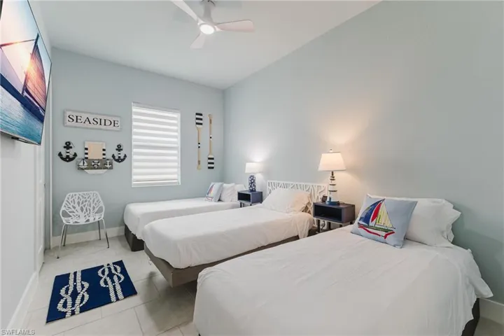 Bright room with cool-toned wall paint and tile flooring