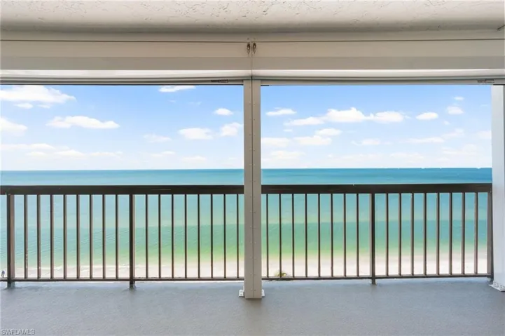 Spectacular gulf beach view from balcony with peace of mind new electric roll down hurricane shutters.