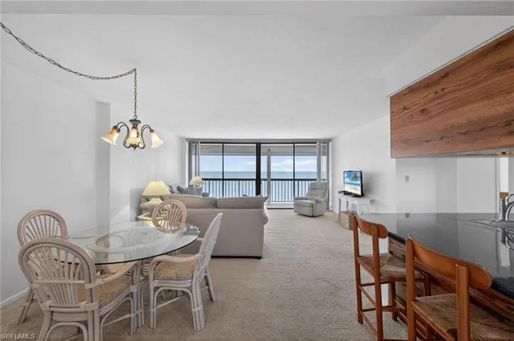 Kitchen, dining and family room with views of beach