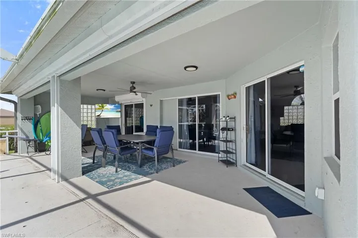View of patio / terrace featuring a ceiling fan and outdoor dining area