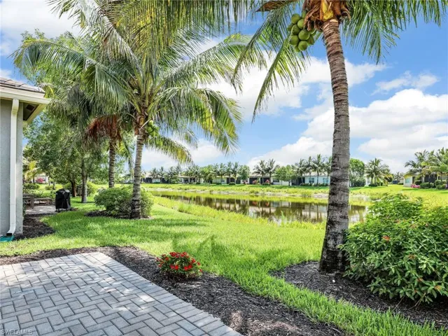 View of yard with a water view