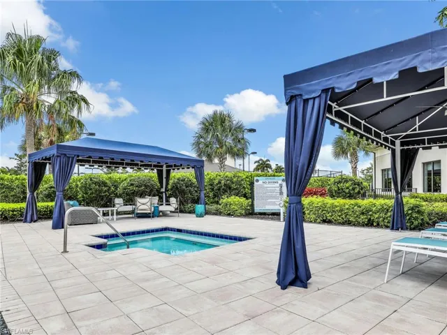 View of pool featuring a gazebo and a patio area
