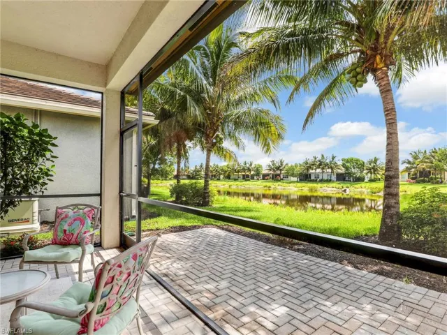 Unfurnished sunroom with a water view