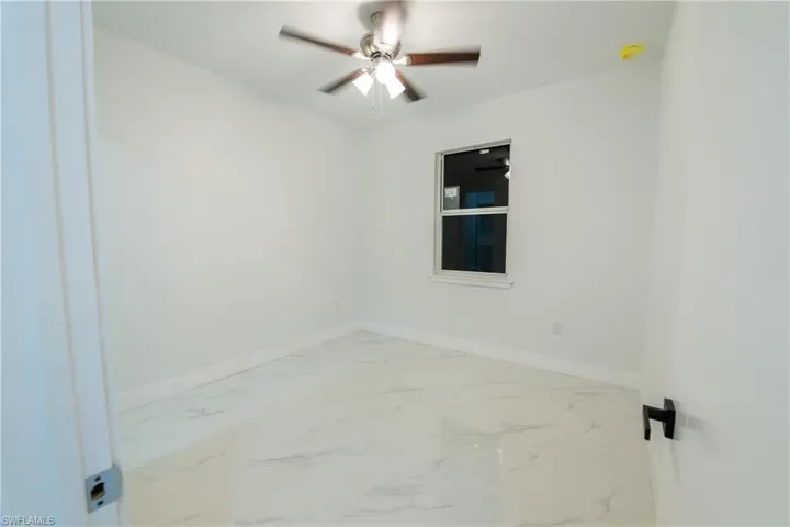 Unfurnished room with ceiling fan