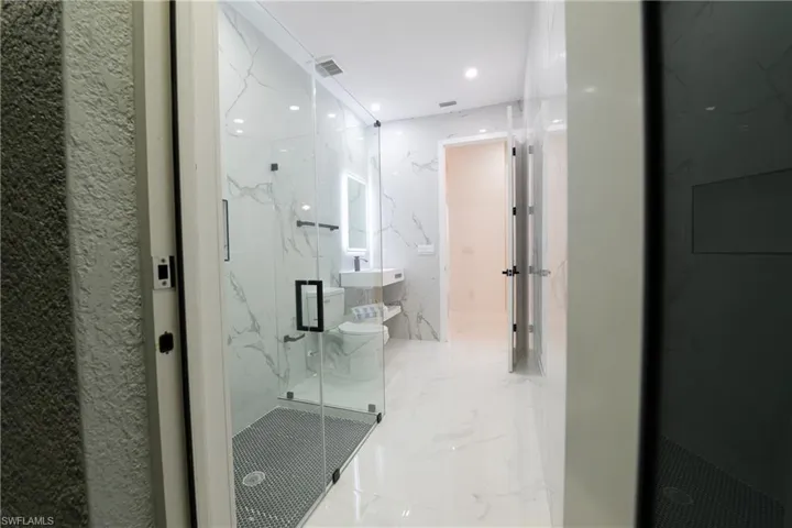 Bathroom with an enclosed shower