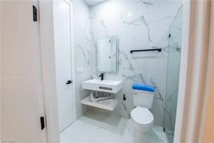 Bathroom with sink and toilet