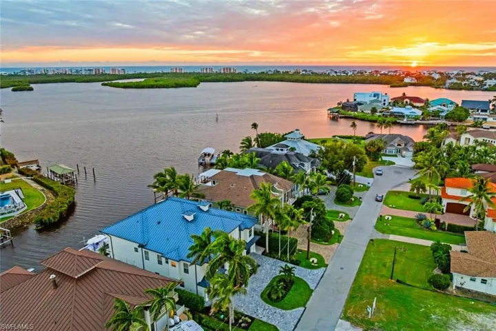 Aerial view at dusk of a residential view and a water view