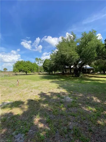 View of green lawn with a view of rural / pastoral area