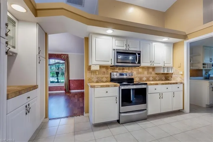 Kitchen with new stainless steel appliances (Before Paint)