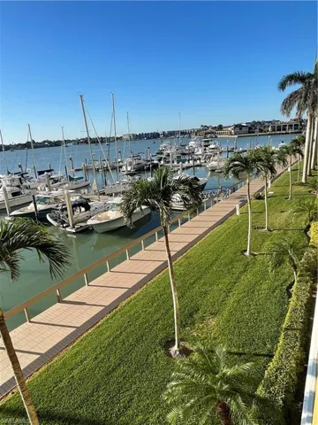 Property view of water featuring a dock