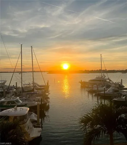 Property view of water featuring a boat dock