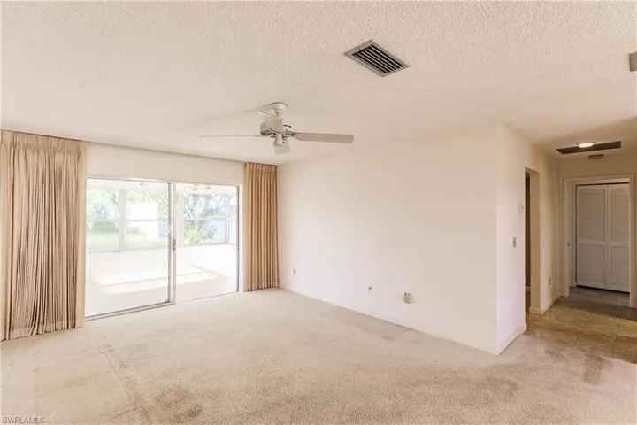 Living Room, Hallway to Kitchen, Laundry Room & 2nd Bedroom & Bathroom