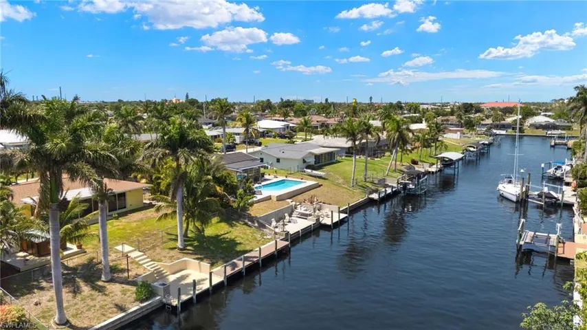 Bird's eye view with a water view and a residential view