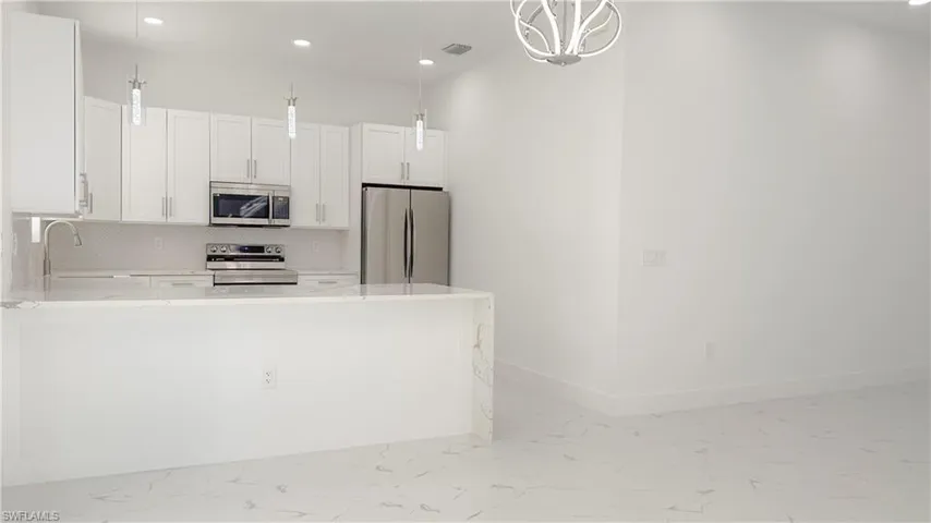 1028  19th SW ST, Naples, FL 34117