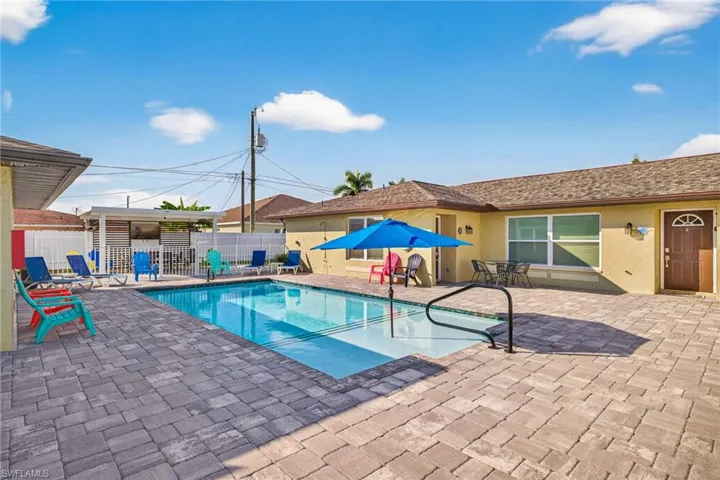 View of swimming pool with a patio