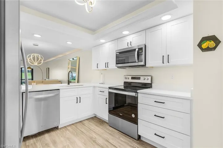 Kitchen with sink, stainless steel appliances