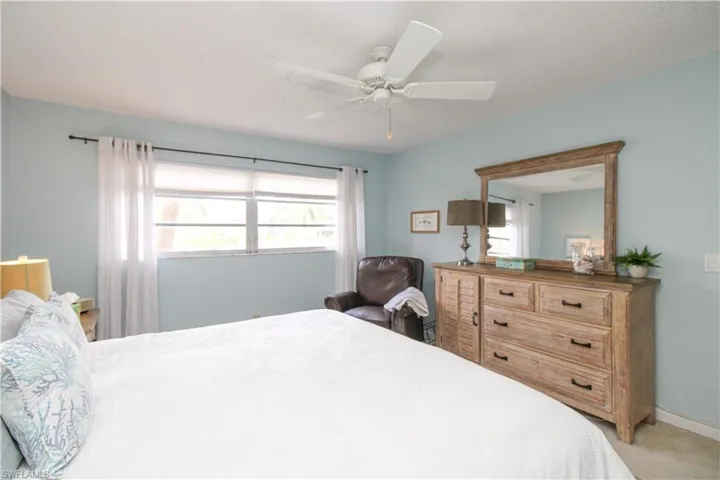 Bedroom featuring carpet flooring and ceiling fan