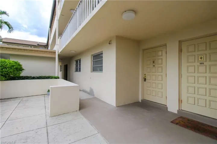 Doorway to property with a balcony